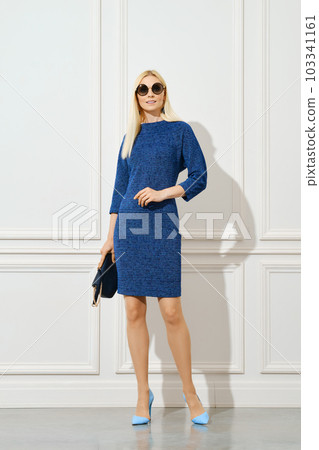 Classy woman in stylish casual urban outfit Classy woman in stylish casual urban outfit 103341161