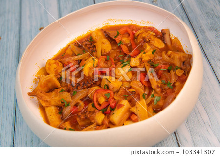 Recipe for octopus Provencal vegetables style Recipe for octopus Provencal vegetables style 103341307