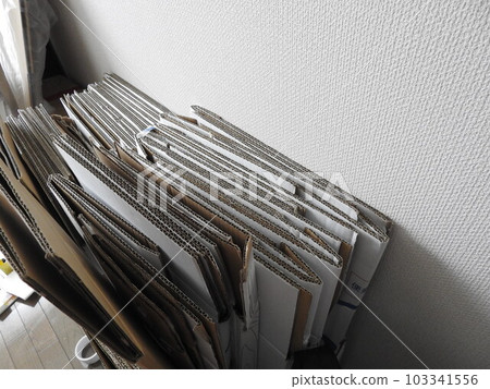Folded cardboard, cardboard, recyclable waste 103341556
