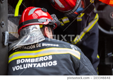 Car Crash Traffic Accident. Firefighters Rescue Injured Trapped Victims. Firemen give First Aid to Car Crash Traffic Accident. Firefighters Rescue Injured Trapped Victims. Firemen give First Aid to 103346648