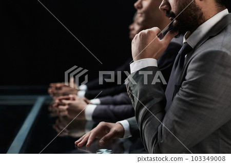 Business people working late at modern office 103349008