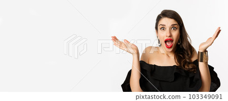 Fashion and beauty concept. Close-up of excited woman receive marriage proposal and reacting happy, standing over white background 103349091