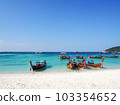 Thai remote island beach moored boat 103354652