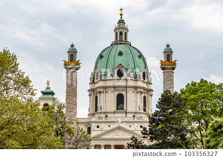 Dome of Karlskirche baroque church in Karlsplatz square in Vienna, Austria Dome of Karlskirche baroque church in Karlsplatz square in Vienna, Austria 103356327