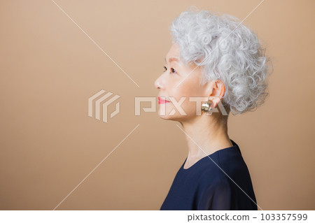 A woman with gray hair A woman with gray hair 103357599