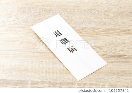 resignation letter on desk 103357841