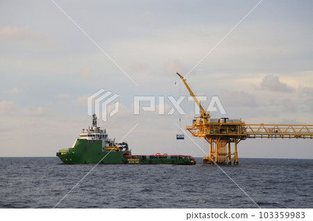 Offshore construction platform for production oil and gas. Oil and gas industry and hard work. Production platform and operation process by manual and auto function from control room. Offshore construction platform for production oil and gas. Oil and gas industry and hard work. Production platform and operation process by manual and auto function from control room. 103359983