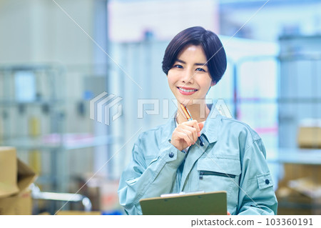 Female businessman in work clothes checking luggage Female businessman in work clothes checking luggage 103360191