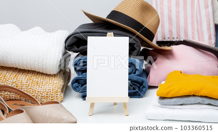 Reduce and reuse concept. Preparing clothes for swap. Waste problem in fashion industry. Copy spase Reduce and reuse concept. Preparing clothes for swap. Waste problem in fashion industry. Copy spase 103360515
