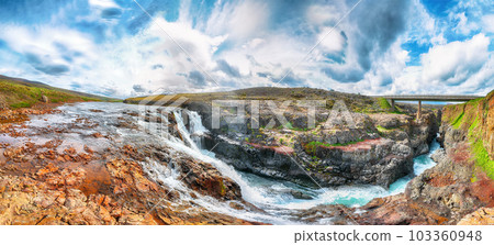 Breathtaking view of  Kolufossar waterfall at summer sunny day. 103360948