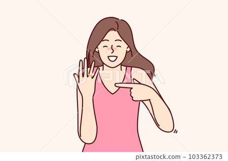 Happy bride with wedding ring shows off gift from groom and rejoices at proposal to get married Happy bride with wedding ring shows off gift from groom and rejoices at proposal to get married 103362373