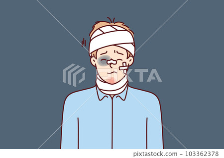 Beaten man with bandages on his head and band-aid on his face after accident or catastrophe 103362378