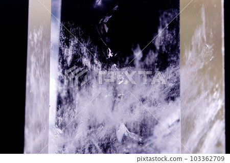 Macro mineral stone Crystal rock crystal on a black background 103362709