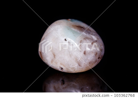 Macro Mineral Stone Amazonite on a black background 103362768