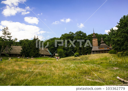 Old wooden church in the village 103362779