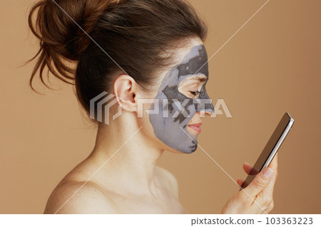 happy modern woman using smartphone 103363223