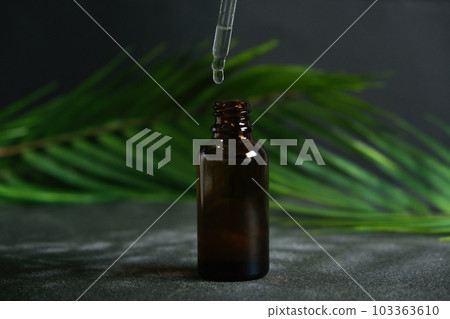Drop of clear liquid, oil, serum or tincture 103363610