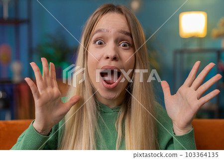 Excited woman girl surprised, shocked by sudden victory, good win news, celebrating, wow reaction 103364135