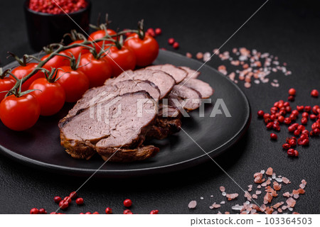 Delicious beef steak with salt, spices and herbs on a ceramic plate Delicious beef steak with salt, spices and herbs on a ceramic plate 103364503