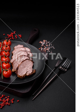 Delicious beef steak with salt, spices and herbs on a ceramic plate Delicious beef steak with salt, spices and herbs on a ceramic plate 103364513