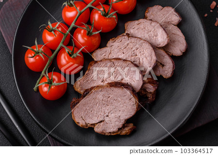 Delicious beef steak with salt, spices and herbs on a ceramic plate Delicious beef steak with salt, spices and herbs on a ceramic plate 103364517