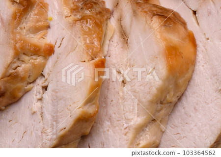 Delicious fresh grilled chicken fillet with salt, spices and herbs on a ceramic plate Delicious fresh grilled chicken fillet with salt, spices and herbs on a ceramic plate 103364562