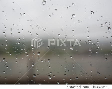 Car window glass with rain drops 103370380