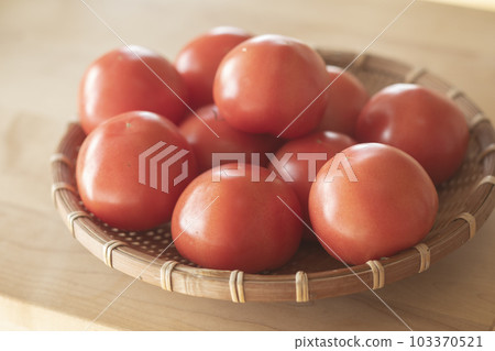 Tomato in a colander 103370521