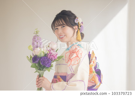 A portrait of a woman wearing a kimono with full kimono 103370723