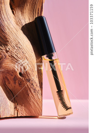 Cosmetic oil for the growth of eyebrows and eyelashes with a brush. 103371159