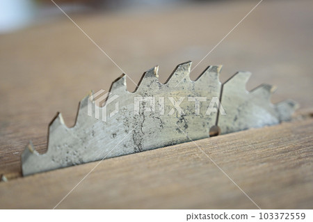 sharp metal saw on wood plank texture background, construction machine sharp metal saw on wood plank texture background, construction machine 103372559