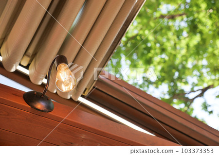 light bulb on celling at home with open roof light bulb on celling at home with open roof 103373353