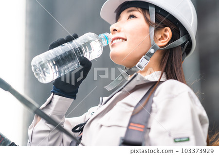 Young female jumper giving hydration Young female jumper giving hydration 103373929