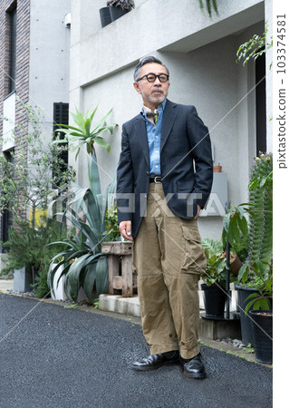 Portrait of a middle-aged man Vertical position Portrait of a middle-aged man Vertical position 103374581
