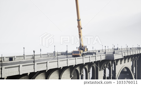 big auto crane on the bridge under constraction 103376011