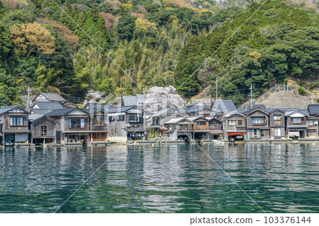 Ine-cho, Kyoto Prefecture, a popular tourist destination with a historic townscape, Ine-no-Funaya in fine weather 103376144