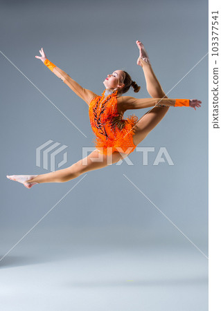 Young slim gymnast in studio 103377541