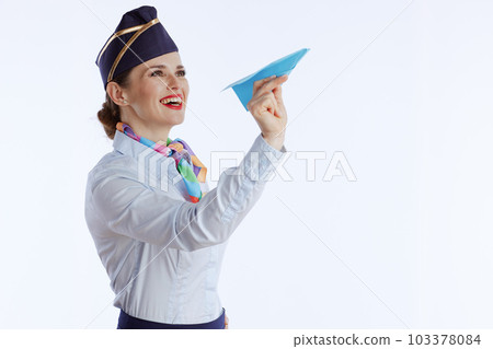 smiling elegant flight attendant woman on white 103378084