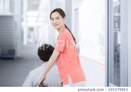 Nurses and physical therapists assisting patients and pushing wheelchairs 103379863