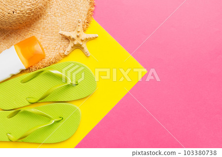 Summer vacation concept flat lay. straw hat beach accessories and flip flop top view. Space for text. travel concept 103380738