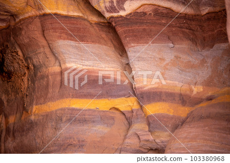 Sandstone rock and mineral layers in Petra, Jordan 103380968