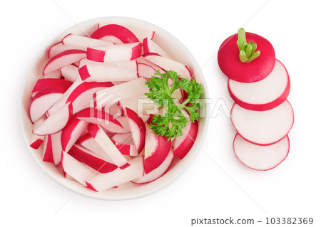 Radish slices in ceramic bowl isolated on white background. Top view. Flat lay 103382369