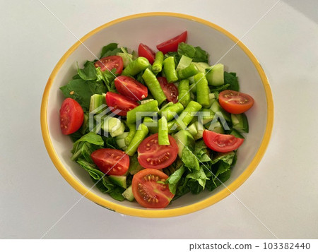 The famous Aegean salad of Turkish cuisine, consisting of tomatoes, arugula, cucumbers and peppers The famous Aegean salad of Turkish cuisine, consisting of tomatoes, arugula, cucumbers and peppers 103382440