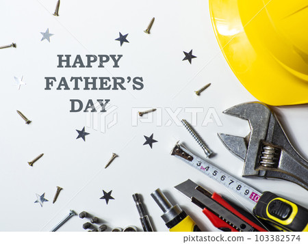Construction tools, hard hat on white background with Happy Fathers day 103382574
