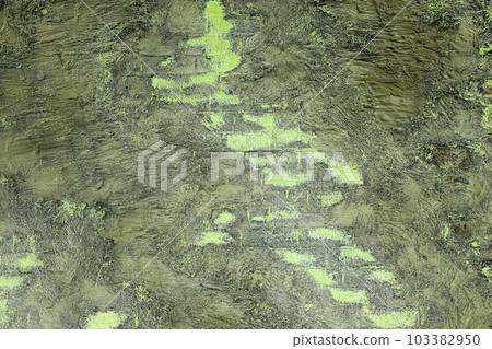 Abstract green gray brick wall with gray brown waves spots 103382950
