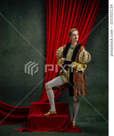 Portrait of young man, royal person standing and counting paper money against dark green, vintage background Portrait of young man, royal person standing and counting paper money against dark green, vintage background 103383134