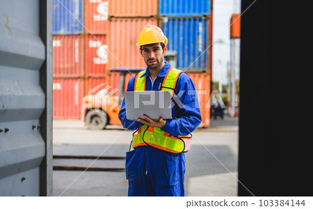Professional industrial engineer worker working at container cargo yard Professional industrial engineer worker working at container cargo yard 103384144