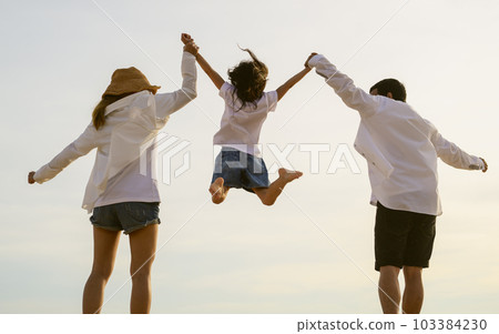 Happy family spending vacation time together on beach, Family with beach travel Happy family spending vacation time together on beach, Family with beach travel 103384230