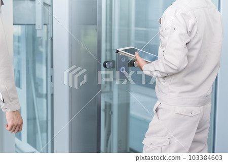 Inspection of buildings and equipment Workers pointing fingers to check and maintain Inspection of buildings and equipment Workers pointing fingers to check and maintain 103384603