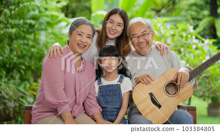 Happy family portrait, Senior grandparents with daughter and grandchild at home Happy family portrait, Senior grandparents with daughter and grandchild at home 103384805